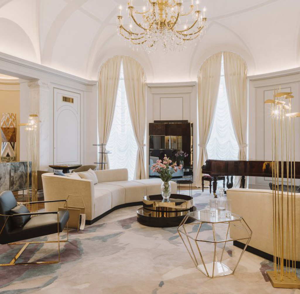 Golden chandelier in luxury hotel room Warsaw