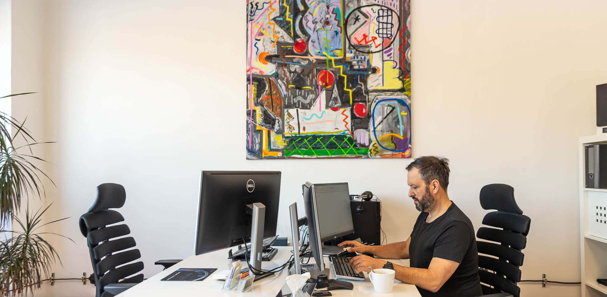 Designer Filip Houdek working in the office