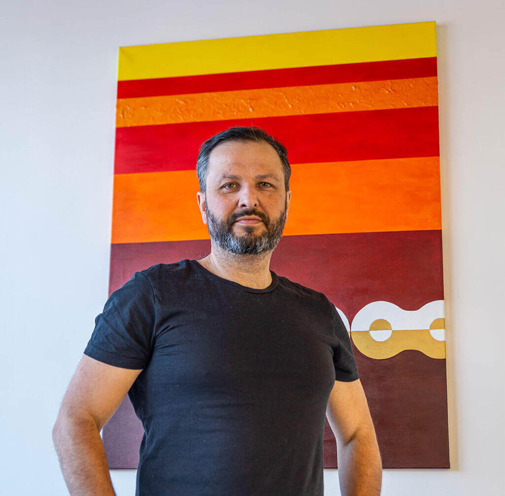 Designer Filip Houdek with his painting